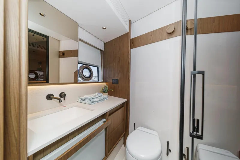 Slide: The Image of Luxurious bathroom interior of 2026 Azimut Fly 72 yacht, featuring modern fixtures and elegant design. - 62