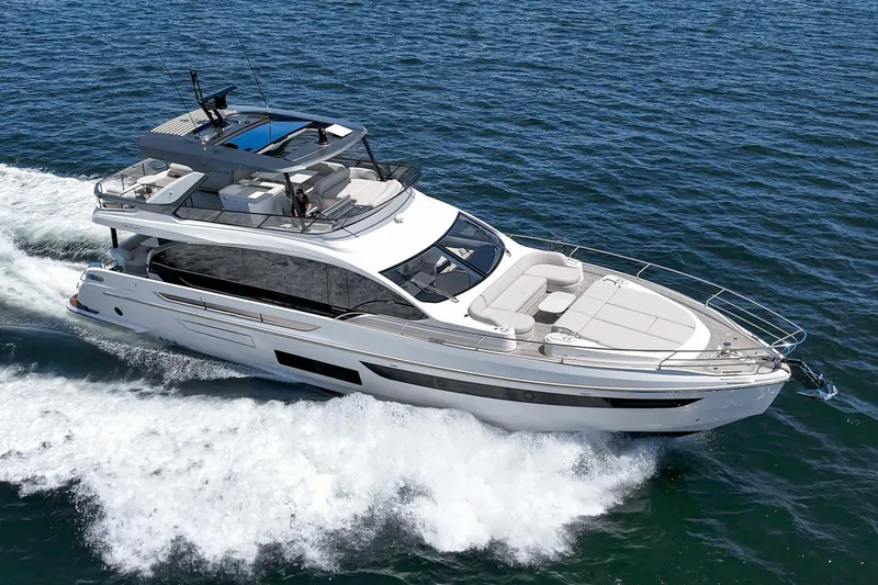 Slide: The Image of 2026 Azimut Fly 72 yacht cruising on open water, showcasing luxury design and sleek lines. - 9
