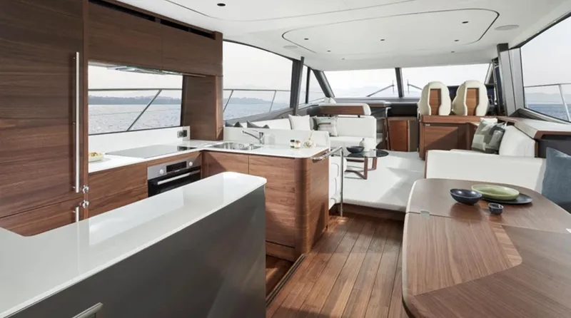 Slide: The Image of Luxurious interior of 2025 Princess F65 yacht with modern kitchen and seating area. - 10