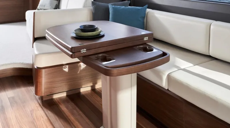 Slide: The Image of Luxurious interior of 2025 Princess F65 yacht with elegant wooden table and seating. - 13