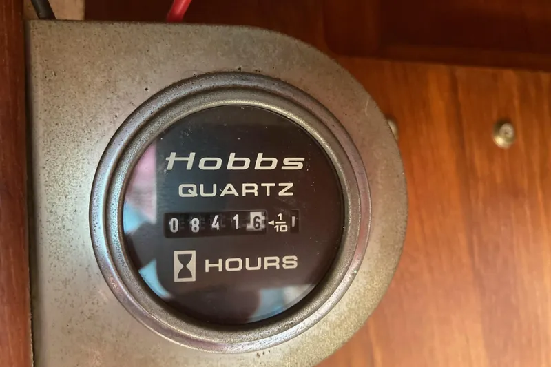 Slide: The Image of Control panel of a 1989 Bayliner 3288 Motoryacht with red switches and labels. - 47