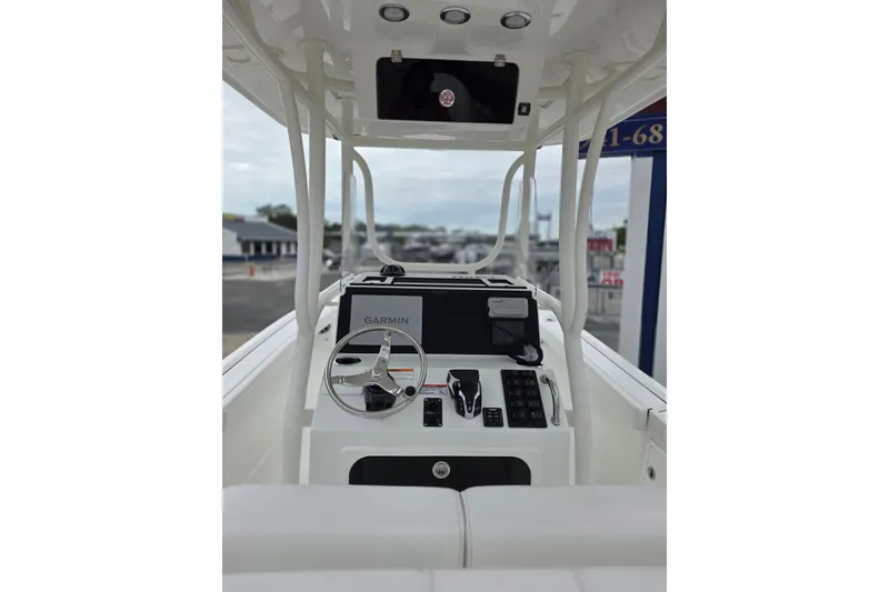 Slide: The Image of 2026 Parker 230 Coastal Elite boat dashboard with Garmin navigation system. - 21