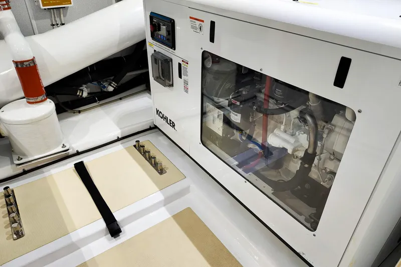 Slide: The Image of Luxurious 2022 Marlow Voyager yacht deck with seating, table, and palm tree view. - 16