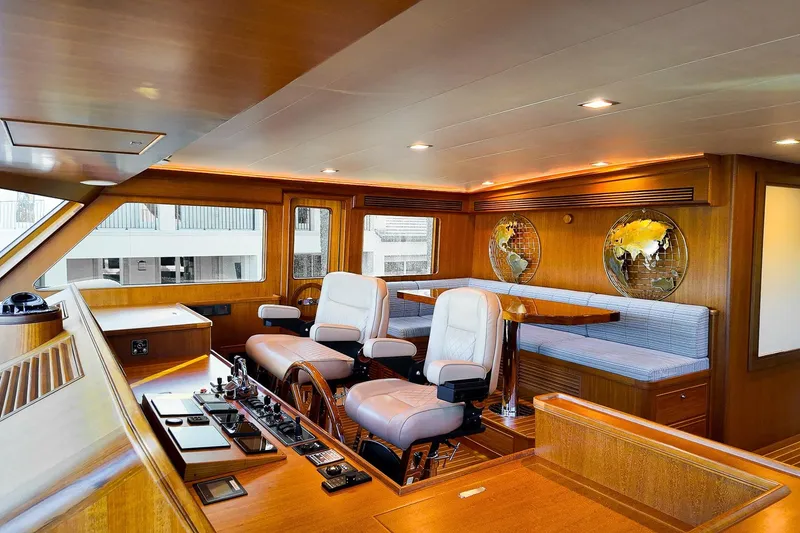 Slide: The Image of Luxurious Marlow Voyager Series 2022 yacht bedroom with elegant wood finish and plush bedding. - 24