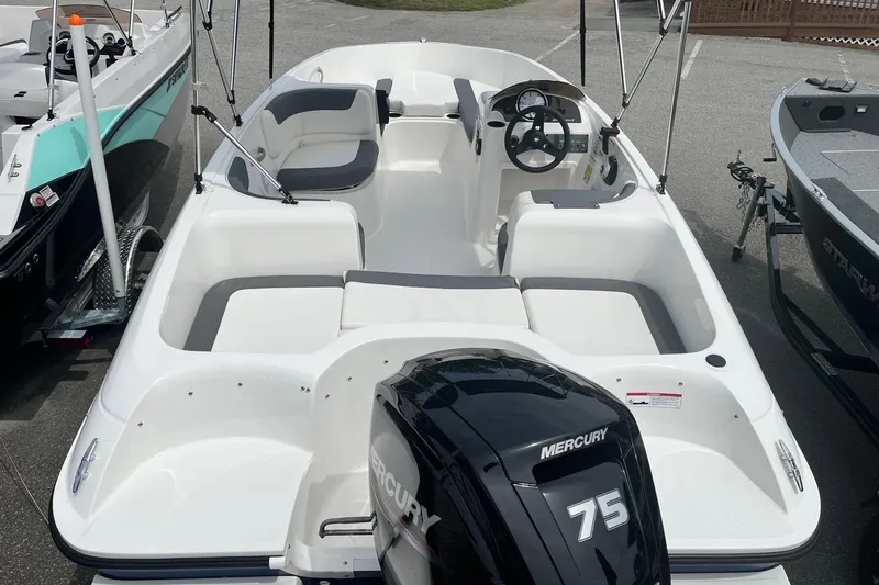 Slide: The Image of 2026 Bayliner Element E16 boat with Mercury 75 engine, featuring spacious seating and modern design. - 12