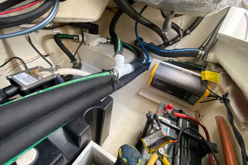 Slide: The Image of 2018 Robalo R242 Center Console boat interior wiring and components. - 46