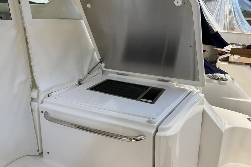 Slide: The Image of 2023 Tiara Yachts 43 Open yacht interior with open storage compartment. - 6