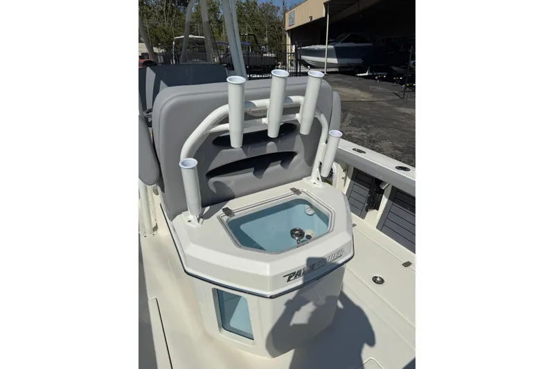 Slide: The Image of 2026 Pathfinder 2400 Open boat with rod holders and livewell. - 15