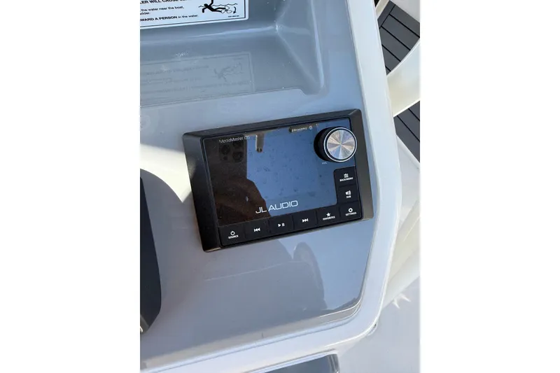 Slide: The Image of JL Audio system on 2026 Pathfinder 2400 Open boat dashboard. - 29