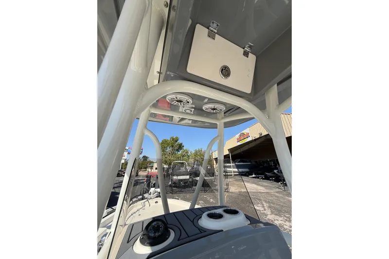 Slide: The Image of 2026 Pathfinder 2400 Open boat interior with T-top and console details. - 32