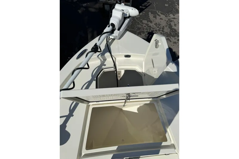 Slide: The Image of 2026 Pathfinder 2400 Open boat with open storage compartment and mounted equipment. - 42