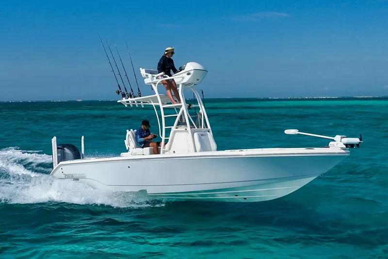 Slide: The Image of Manufacturer Provided Image: 2026 Pathfinder 2400 Open boat cruising on clear turquoise waters. - 55