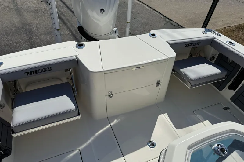 Slide: The Image of 2026 Pathfinder 2400 Open boat interior with seating and storage compartments. - 6