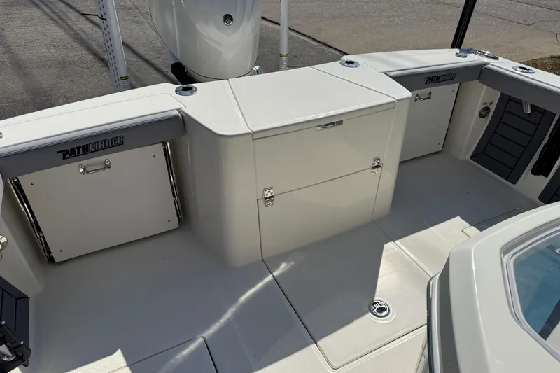 Slide: The Image of 2026 Pathfinder 2400 Open boat interior with storage compartments and seating. - 7