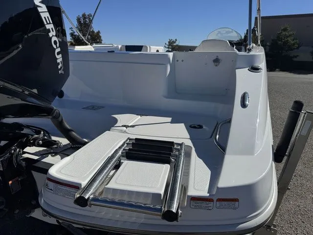Slide: The Image of 2020 Tahoe 2150 boat with Mercury engine and swim platform ladder. - 13