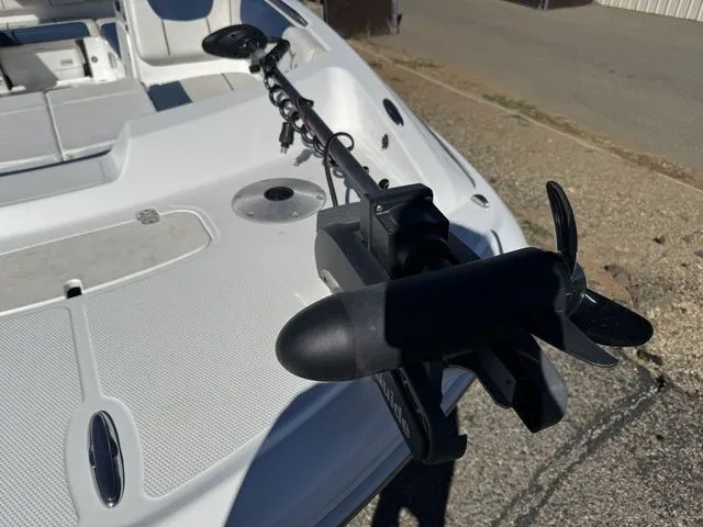 Slide: The Image of Tahoe 2150 boat with trolling motor, 2020 model, on a sunny day. - 20