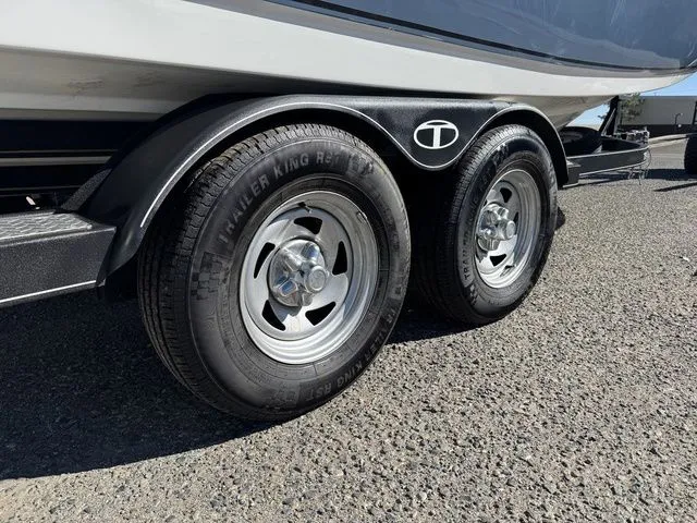 Slide: The Image of 2020 Tahoe 2150 trailer with dual wheels on a sunny day. - 8
