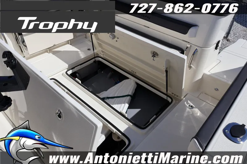 Slide: The Image of 2025 Trophy T 25 Pilothouse boat interior storage compartment, Antonietti Marine contact details visible. - 11