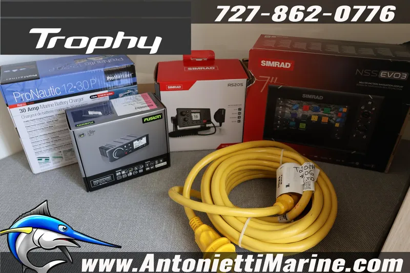 Slide: The Image of Marine electronics and accessories for Trophy T 25 Pilothouse 2025, featuring Simrad and ProNautic products. - 15