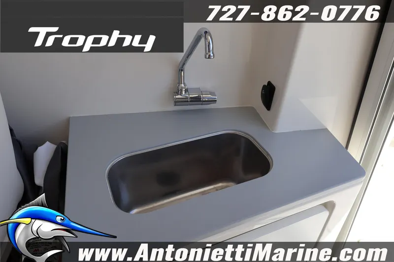 Slide: The Image of 2025 Trophy T 25 Pilothouse sink and faucet, Antonietti Marine branding. - 20
