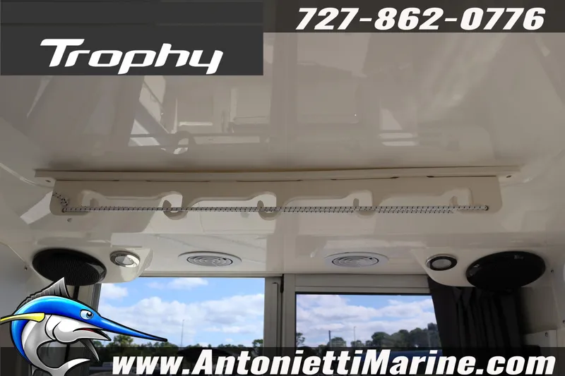Slide: The Image of 2025 Trophy T 25 Pilothouse interior with logo and contact details for Antonietti Marine. - 24