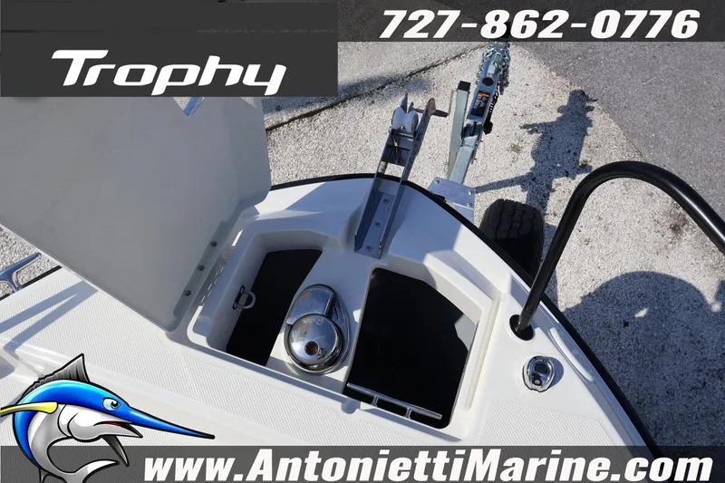 Slide: The Image of 2025 Trophy T 25 Pilothouse boat deck with anchor storage and trailer hitch. - 38