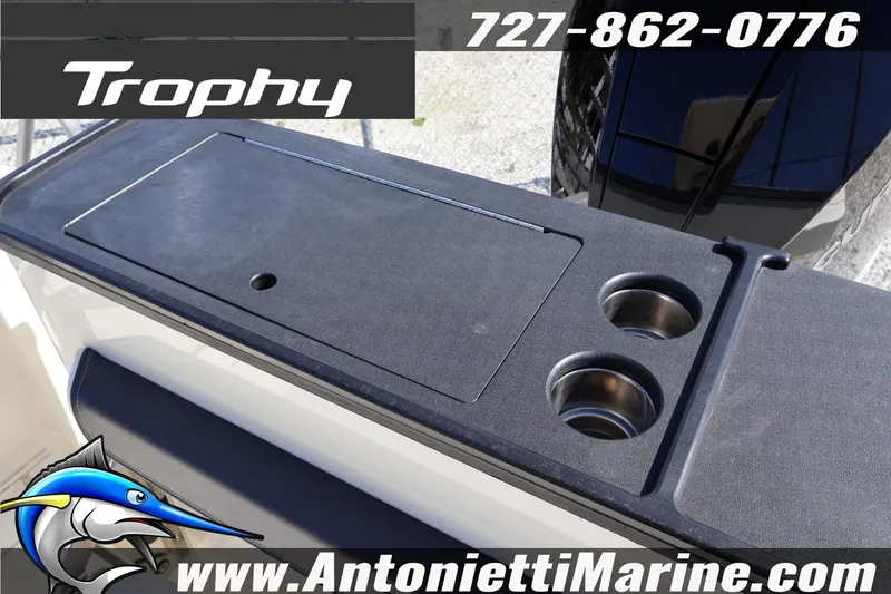 Slide: The Image of 2025 Trophy T 25 Pilothouse boat console with cup holders, Antonietti Marine branding. - 49