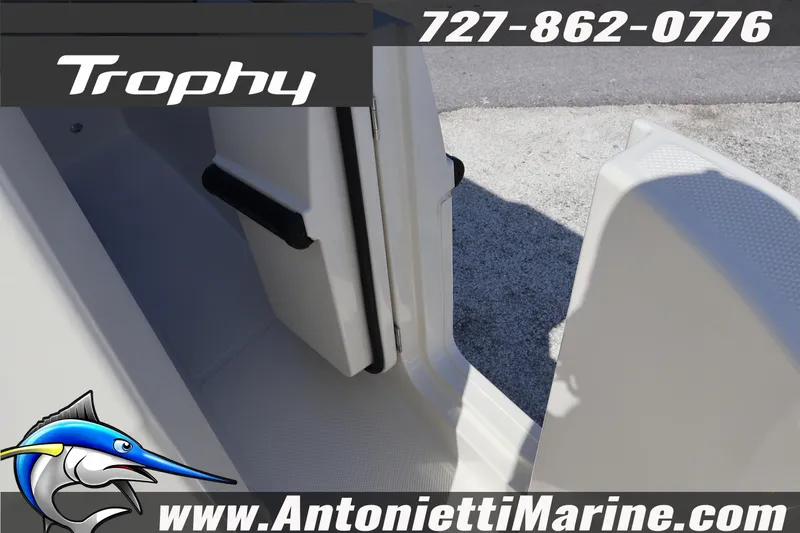 Slide: The Image of 2025 Trophy T 25 Pilothouse boat interior with open door, Antonietti Marine branding. - 53