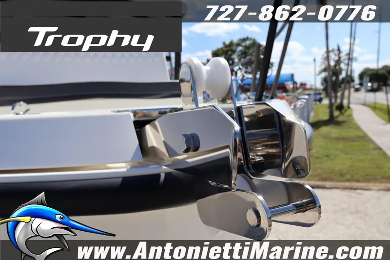 Slide: The Image of 2025 Trophy T 25 Pilothouse boat with chrome details, displayed at Antonietti Marine. - 7
