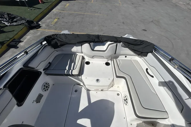 Slide: The Image of 2019 Yamaha Boats SX190 interior with seating and storage compartments. - 10