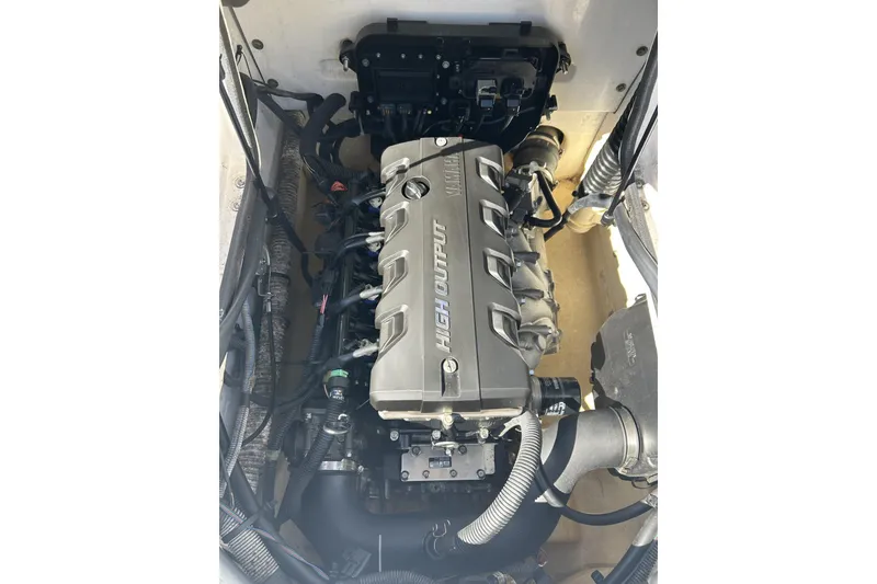 Slide: The Image of 2019 Yamaha Boats SX190 engine compartment showcasing high output engine components. - 9