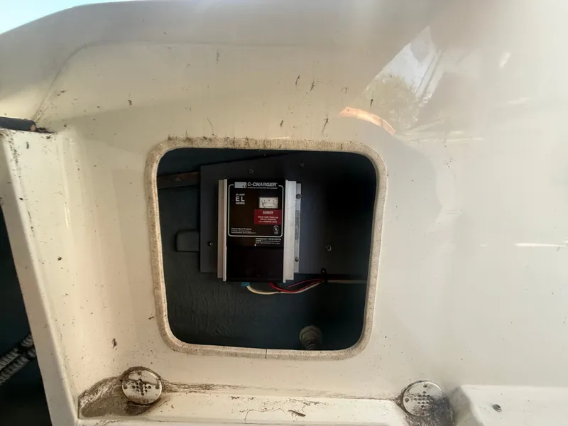 Slide: The Image of Electrical compartment of a 1996 Sea Ray 280 Sun Sport boat. - 23