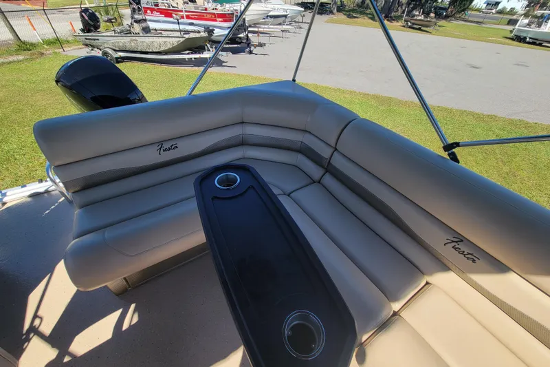 Slide: The Image of 2022 Fiesta 22' Fundeck L Sofa RE Deluxe with comfortable seating and cup holders. - 13