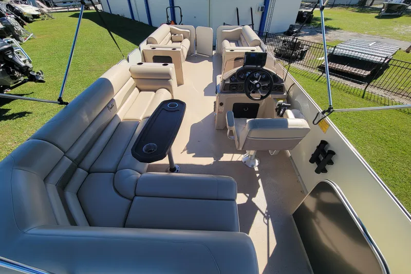 Slide: The Image of 2022 Fiesta 22' Fundeck L Sofa RE Deluxe pontoon boat interior with plush seating and helm. - 16