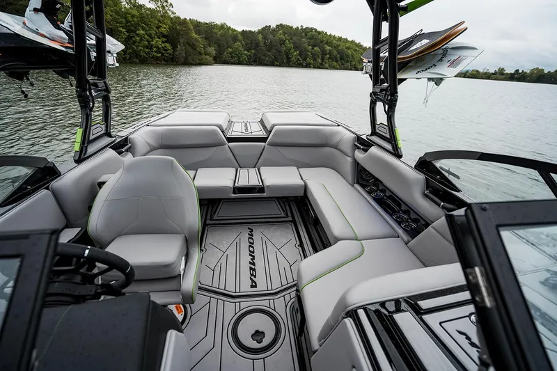 Slide: The Image of Manufacturer Provided Image: 2026 Moomba Mondo boat interior with spacious seating on a calm lake. - 5