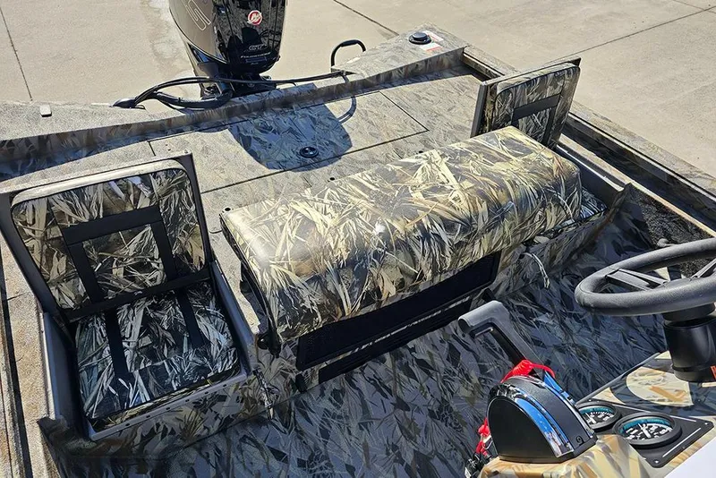 Slide: The Image of 2026 Ranger RB190 boat interior with camouflage seats and steering console. - 14
