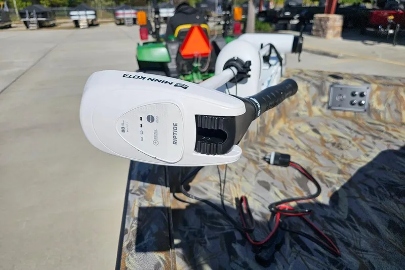 Slide: The Image of Minn Kota Riptide motor on 2026 Ranger RB190 boat, outdoor setting. - 23