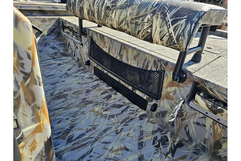Slide: The Image of 2026 Ranger RB190 boat interior with camouflage design and seating. - 24