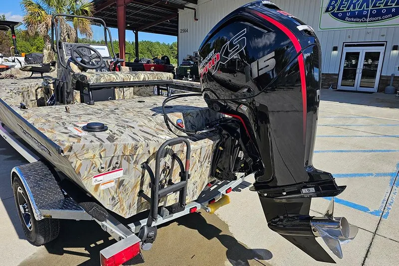 Slide: The Image of 2026 Ranger RB190 boat with camo design and powerful outboard motor. - 9