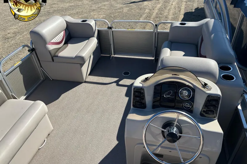 Slide: The Image of 2019 Qwest Edge 816 CR boat interior with seating and steering console. - 5