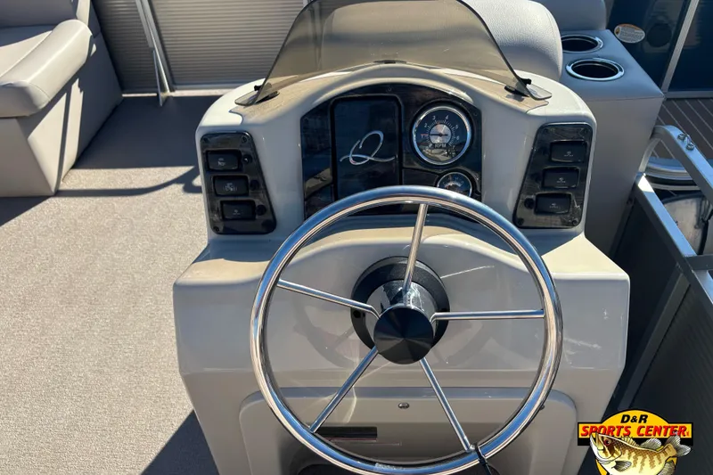 Slide: The Image of Steering console of 2019 Qwest Edge 816 CR pontoon boat with controls and gauges. - 6