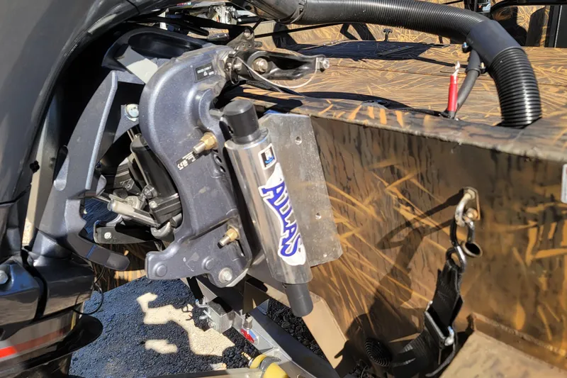 Slide: The Image of Close-up of 2026 G3 Bay 21 GX Tunnel boat engine and hydraulic system. - 7