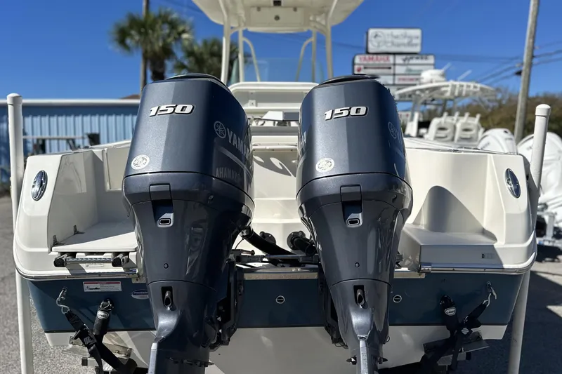 Slide: The Image of 2015 Sailfish 240 CC boat with dual Yamaha 150 outboard engines. - 16