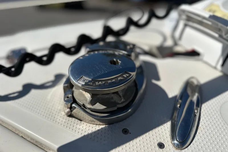 Slide: The Image of 2015 Sailfish 240 CC boat deck with Lewmar winch and cleat. - 6