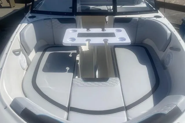 Slide: The Image of 2026 Bayliner M17 boat interior with seating and table, featuring modern design and comfort. - 12