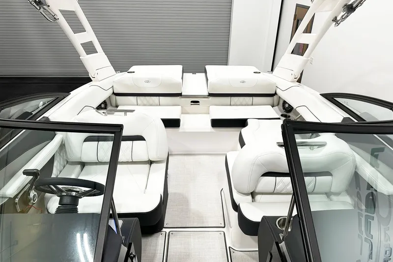 Slide: The Image of Luxurious interior of 2025 Regal LS2 boat with white seating and modern design. - 11