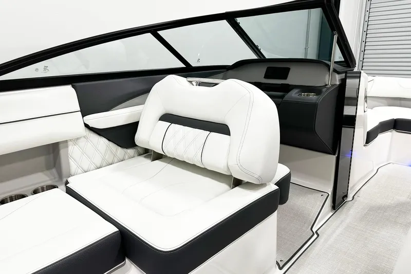 Slide: The Image of 2025 Regal LS2 boat interior with luxurious white seating and modern design. - 9