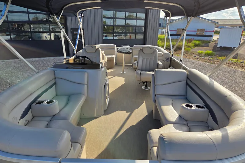 Slide: The Image of 2017 Bennington 22 SSRX pontoon boat with spacious seating and modern interior design. - 5