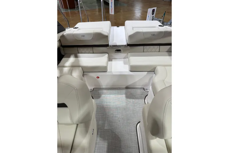 Slide: The Image of 2026 Regal LS2 boat interior with luxurious white seating and modern design. - 11