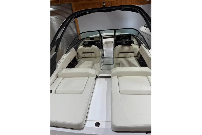 Slide: The Image of Luxurious interior of 2026 Regal LS2 boat with sleek white seating and modern design. - 4